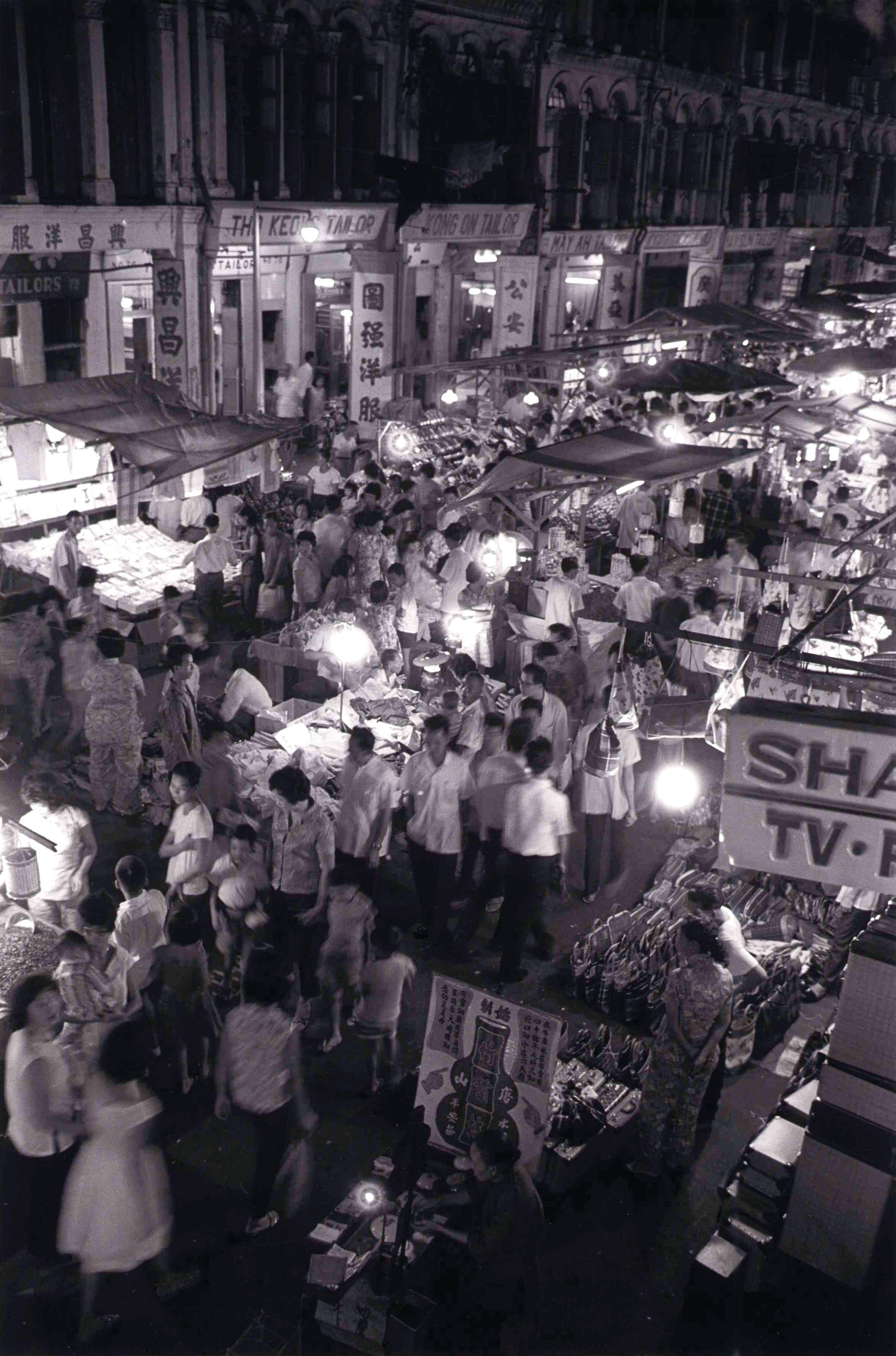 Wet markets by day but when night fall, the pasar malam (night market) in Smith Street and Trengganu Street attracted massive crowds in 1965. Courtesy of Ministry of Information and the Arts, Singapore.